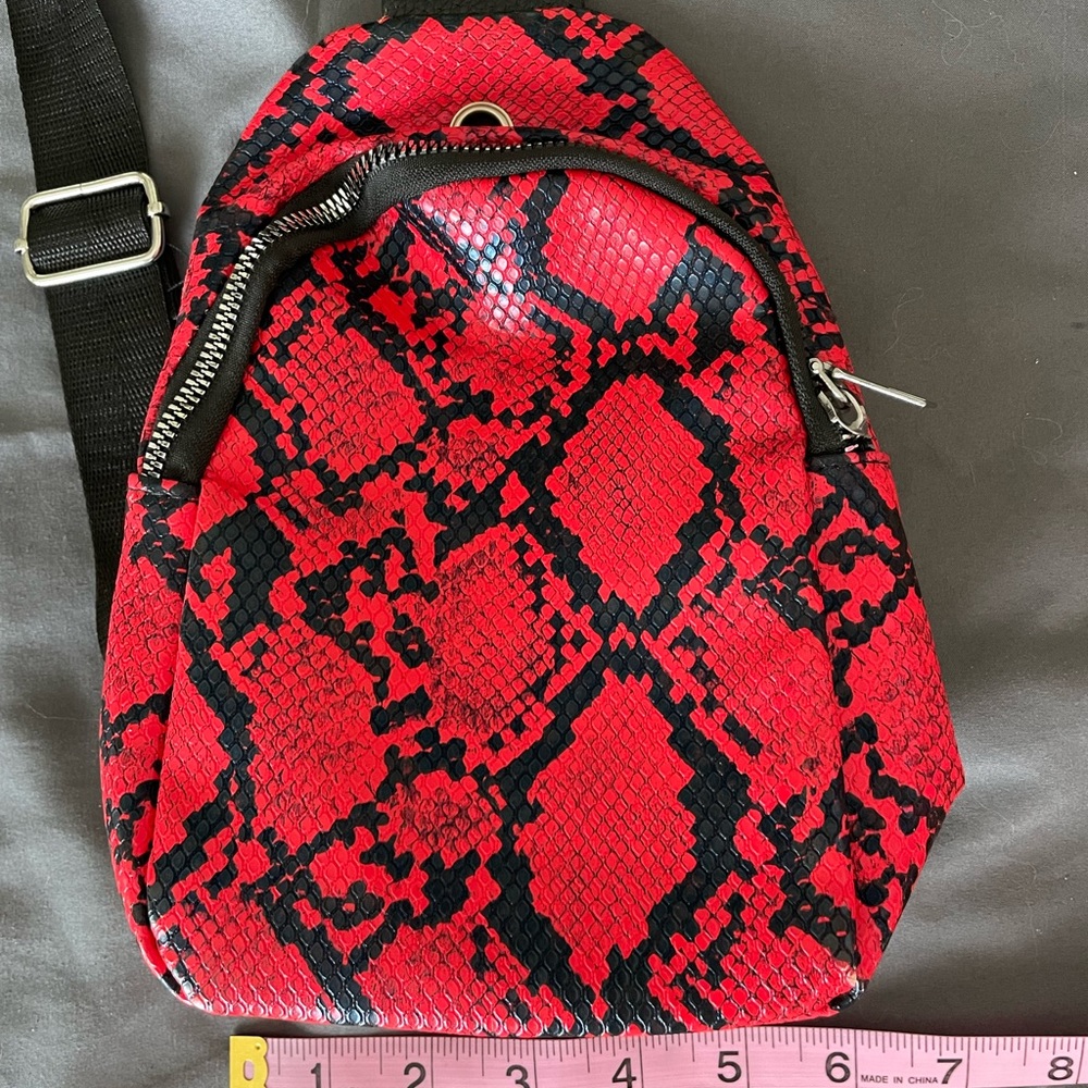 Snake skin sling bag